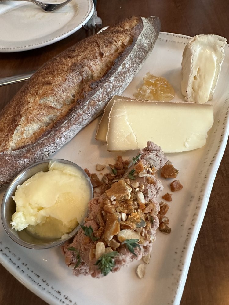 Charcuterie plate with baguette and housemade butter